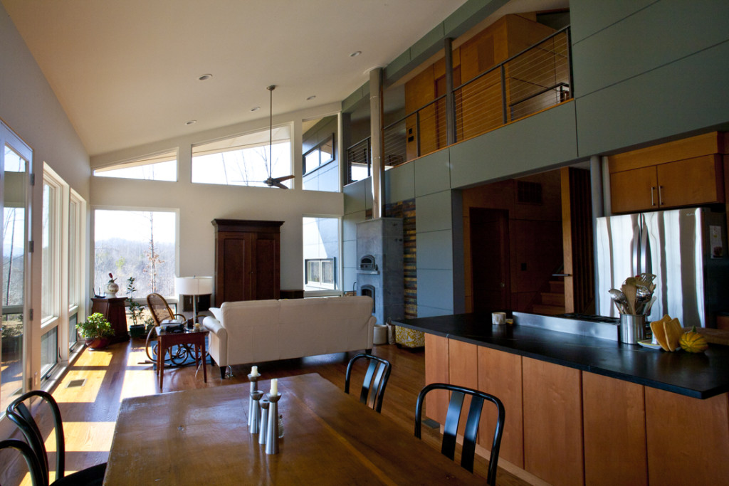Interior View of Modern Open Plan Living Dining and Kitchen by Charlottesville Architects.