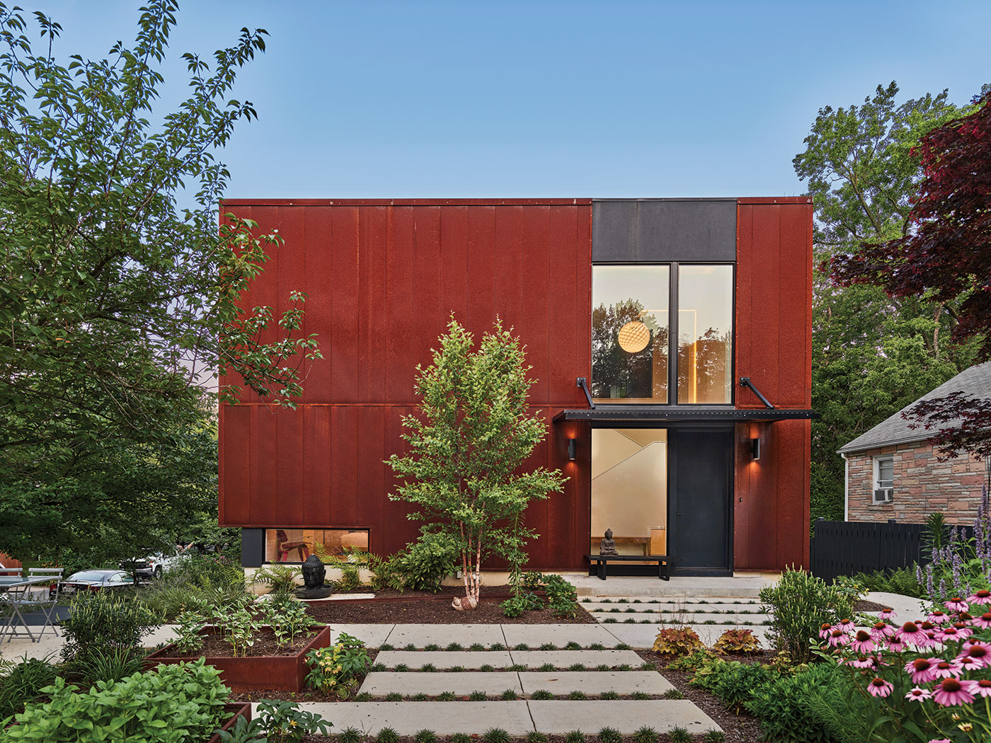 Awarded Arlington Green Choice Platinum Award Green and Modern Design has Corten Rusted Metal Panels mixed with Black Painted Metal Panels and Cantilevered Canopy Designed by HEDS Best Virginia Architects.