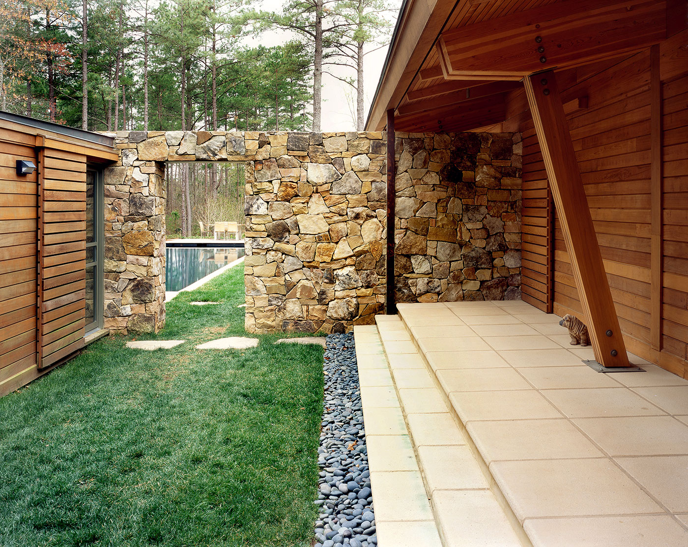 Curved Wood Glulam Beams, Canted Ganged Wood Columns at Limestone Terrace with Stone Wall n Charlotte, NC Modern Home, Designed by Best Virginia Architects.