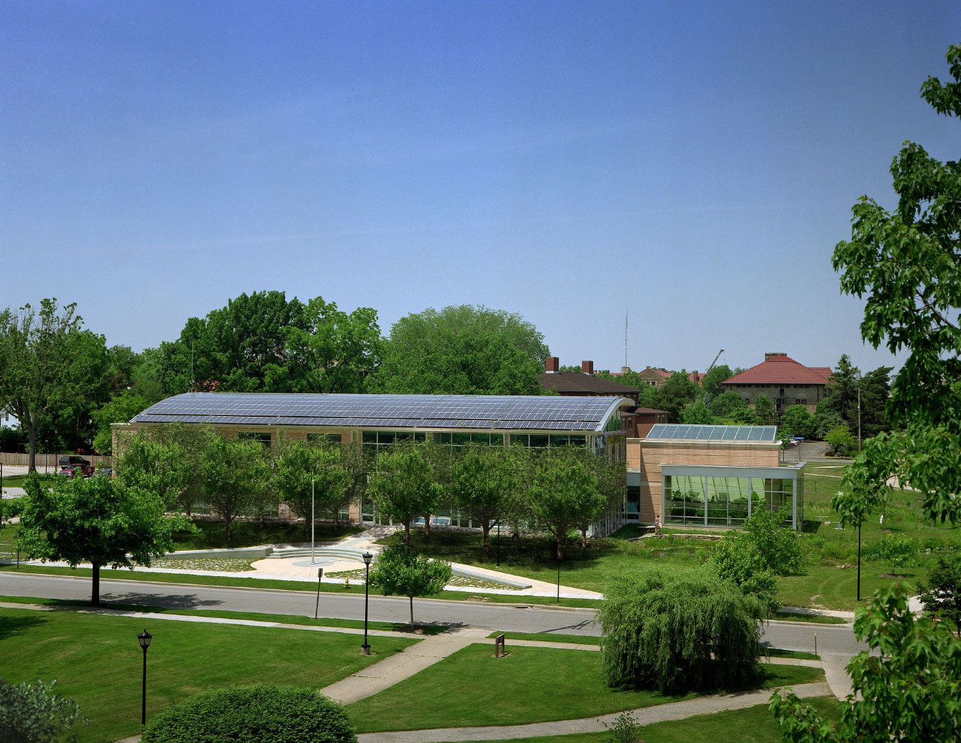 Curved Standing Seam Metal Roof Generates Energy for the Net-Zero Adam J Lewis Environmental Studies Center at Oberlin College by Virginia Green Architect.