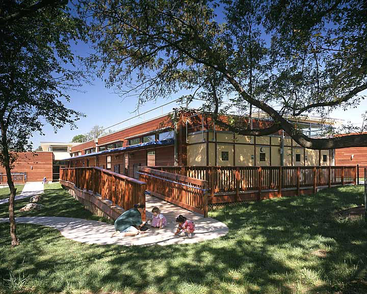 Children's Day Care Center in St Louis by Virginia Architect has Play Mounds and Sidewalk Chalk Areas.